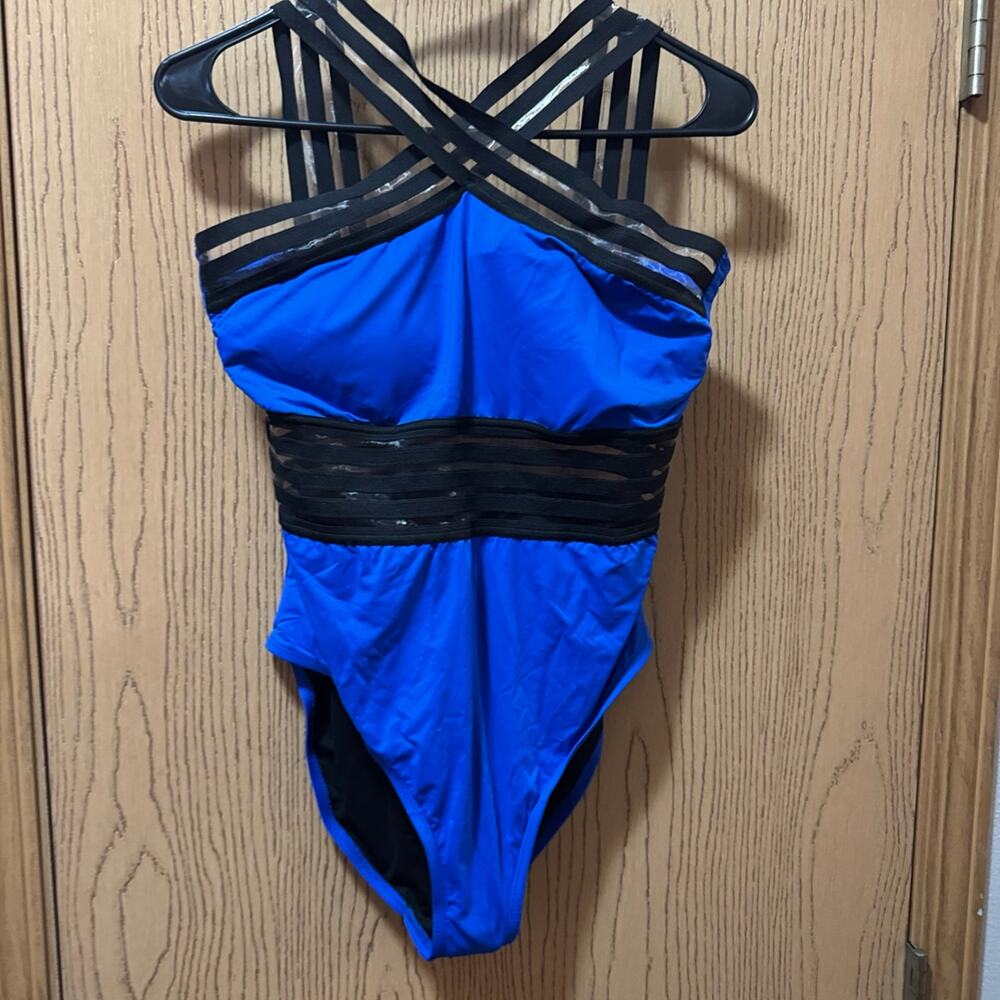 One piece bathing suit with cutouts size L